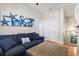 Living room featuring a modern sofa and artwork at 145 50Th St, Holmes Beach, FL 34217