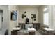 Cozy cafe area with several tables, a coffee station, and a beautiful window with lots of light at 14835 Lyla Ter, Bradenton, FL 34211