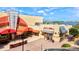 A cinema and sports pub are showcased on a sunny day, offering diverse entertainment options for the community at 14835 Lyla Ter, Bradenton, FL 34211