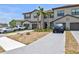 Charming townhome featuring an attached garage and a well-manicured front yard at 14835 Lyla Ter, Bradenton, FL 34211