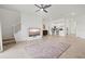 Open-concept living area with tile floors, bright lighting, and easy access to the kitchen at 14835 Lyla Ter, Bradenton, FL 34211