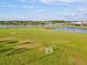 Well-maintained community soccer field with manicured green grass and views of the lake at 14835 Lyla Ter, Bradenton, FL 34211