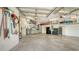 Spacious two-car garage with tool storage, shelving and overhead storage at 1864 Goldenrod St, Sarasota, FL 34239
