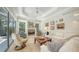 Spacious living room with tray ceiling and many windows for natural light at 1864 Goldenrod St, Sarasota, FL 34239