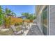 Charming brick patio with furniture and landscaping, perfect for outdoor relaxation and entertaining at 2420 Webber St, Sarasota, FL 34239