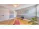 Bedroom featuring hardwood floors, bright light from the window and neutral paint throughout at 2420 Webber St, Sarasota, FL 34239