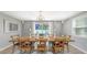 Well-lit dining room with stylish decor, providing an inviting setting for meals and gatherings at 2420 Webber St, Sarasota, FL 34239