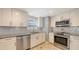 Kitchen features stainless steel appliances, granite countertops and tile backsplash at 2420 Webber St, Sarasota, FL 34239