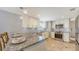 Well-lit kitchen featuring granite countertops and stainless steel appliances at 2420 Webber St, Sarasota, FL 34239