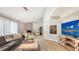Comfortable living room with fireplace, decor and entertainment center at 2420 Webber St, Sarasota, FL 34239