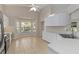 Bright kitchen with bay window, white cabinets, and ample counter space at 2662 6Th E Ct, Ellenton, FL 34222