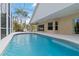 Inviting screened-in pool area with plenty of space for outdoor entertaining and a beautiful view at 2662 6Th E Ct, Ellenton, FL 34222