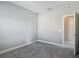 Bedroom with neutral walls, carpet flooring, and doorway at 30073 Southwell Ln, Wesley Chapel, FL 33543