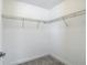 A walk-in closet is equipped with an abundance of wire shelving for maximal storage space at 30073 Southwell Ln, Wesley Chapel, FL 33543