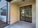 Sliding glass doors lead to an outdoor patio, excellent for entertaining or enjoying the landscape at 30073 Southwell Ln, Wesley Chapel, FL 33543