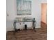 Stylish entryway featuring a glass top console table and coastal-themed decorations at 3110 57Th Avenue E Cir, Bradenton, FL 34203