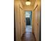 Hallway with linen closet leading to recently updated bathroom at 3110 57Th Avenue E Cir, Bradenton, FL 34203