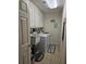 Bright laundry room with washer, dryer, and utility sink at 3110 57Th Avenue E Cir, Bradenton, FL 34203