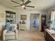 Inviting living area with comfortable seating, built-in shelves, and neutral decor at 3110 57Th Avenue E Cir, Bradenton, FL 34203