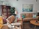 Comfortable living room with leather furniture, unique decor, and a relaxing atmosphere at 3110 57Th Avenue E Cir, Bradenton, FL 34203