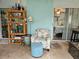 Cozy screened porch with rattan furniture and tropical decorations and lighting at 3110 57Th Avenue E Cir, Bradenton, FL 34203