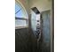 Sleek shower features rainfall shower head, handheld sprayer, and a built in seat at 3110 57Th Avenue E Cir, Bradenton, FL 34203