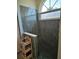 Luxurious shower showcases window, seat, and neutral tile at 3110 57Th Avenue E Cir, Bradenton, FL 34203