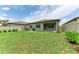 Expansive backyard featuring lush green grass and a fence at 3129 61St E Ter, Ellenton, FL 34222