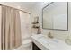 Updated bathroom features a modern vanity, sleek fixtures, and a shower with clean, white subway tile at 3129 61St E Ter, Ellenton, FL 34222