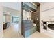 Chic entryway with stylish storage, designer touches, and a glimpse into the spacious, open-concept living areas at 3129 61St E Ter, Ellenton, FL 34222