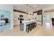 Modern kitchen with white cabinets, a center island with seating, and stainless steel appliances, perfect for cooking at 3129 61St E Ter, Ellenton, FL 34222