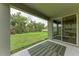 Covered patio with a view of the manicured backyard at 3129 61St E Ter, Ellenton, FL 34222
