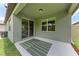 Covered patio extends living space, with views of the lush backyard, and is perfect for outdoor dining and relaxing at 3129 61St E Ter, Ellenton, FL 34222