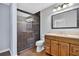 Bathroom featuring a glass enclosed shower and a vanity with a sink at 3320 19Th Street E Ct, Bradenton, FL 34208