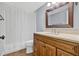 Bathroom with single vanity, wood look tile and shower/tub combo at 3320 19Th Street E Ct, Bradenton, FL 34208