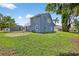 Large lot with a well maintained blue home and spacious, fenced backyard area at 3320 19Th Street E Ct, Bradenton, FL 34208