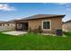Spacious backyard with patio area and a well-maintained lawn at 3712 76Th E St, Palmetto, FL 34221