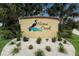 A welcoming sign for Heron Creek is surrounded by lush landscaping, creating an inviting entrance to the neighborhood at 3712 76Th E St, Palmetto, FL 34221