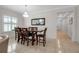 Dining room with chandelier, shuttered windows, and a large table, perfect for entertaining at 3712 76Th E St, Palmetto, FL 34221