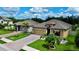 Beautiful single-story home with a well-kept lawn and brick paver driveway at 3712 76Th E St, Palmetto, FL 34221