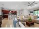 Inviting living space boasts an open concept with a modern kitchen and dining area at 3712 76Th E St, Palmetto, FL 34221