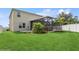 Spacious backyard with a covered lanai, paved patio and a lush lawn at 4005 Willow Branch Pl, Palmetto, FL 34221