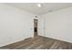 Bedroom with wood-look flooring and ensuite bathroom access provides comfort and convenience for residents at 4005 Willow Branch Pl, Palmetto, FL 34221