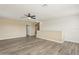 Upstairs loft area featuring modern vinyl flooring and neutral tones at 4005 Willow Branch Pl, Palmetto, FL 34221