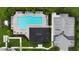 Overhead view of the community pool and parking area featuring lounge chairs and lush landscaping at 4005 Willow Branch Pl, Palmetto, FL 34221