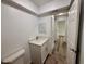 Bathroom featuring toilet and vanity at 4110 Longhorn Dr, Sarasota, FL 34233