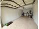 Spacious garage interior with white walls, ample room for parking, and storage at 4110 Longhorn Dr, Sarasota, FL 34233