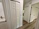 Hallway with closet and vanity at 4110 Longhorn Dr, Sarasota, FL 34233