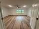 Open and airy living space with new floors and neutral paint, bathed in natural light at 4110 Longhorn Dr, Sarasota, FL 34233