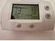 Close up of a thermostat display reading 73 degrees and in cool setting at 4110 Longhorn Dr, Sarasota, FL 34233